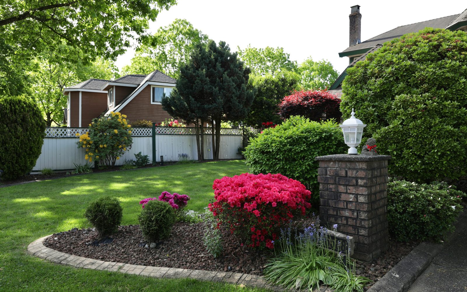 Garden bed, flowering landscape, and property detail care
